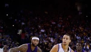 DeMarcus Cousins (z lewej) kontra Stephen Curry.