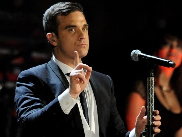 Robbie Williams i Take That zarobią krocie fot. Gareth Cattermole