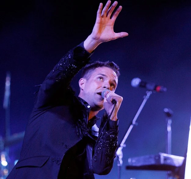 Brandon Flowers, wokalista The Killers - fot. Kevin Winter Brandon Flowers, wokalista The Killers - fot. Kevin Winter