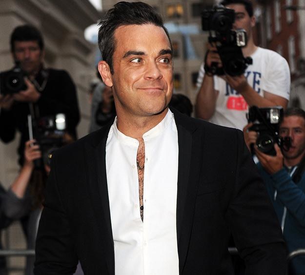 Robbie Williams wrócił do łask kapryśnej brytyjskiej publiczności - fot. Ben Pruchnie