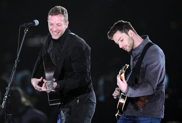 Chris Martin i wart million funtów Guy Berryman fot. Jason Merritt