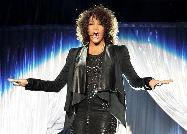 Whitney Houston zaczęła publicznie śpiewać w wieku 11 lat. Występowała w kościele, w chórze gospel - fot. Vittorio Cunino Celotto Whitney Houston zaczęła publicznie śpiewać w wieku 11 lat. Występowała w kościele, w chórze gospel - fot. Vittorio Cunino Celotto