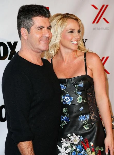 Britney Spears z Simonem Cowellem, twórcą i jurorem "X Factor" (fot. Imeh Akpanudosen)