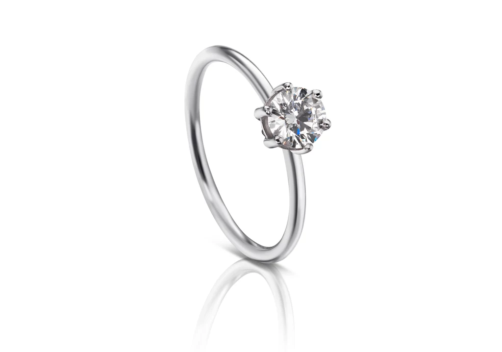 Pierścionek Sweet diamonds. Białe złoto 18kt, diament Pierścionek Sweet diamonds. Białe złoto 18kt, diament