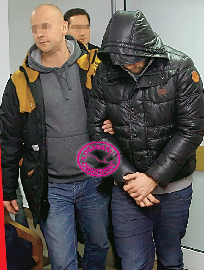 Paweł Z. w asyście policji Paweł Z. w asyście policji