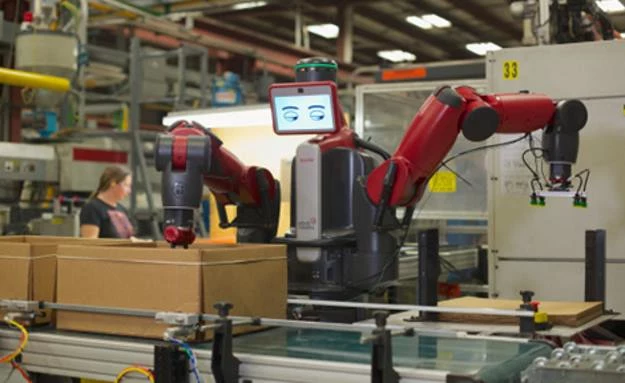 Baxter, już dziś pracuje w amerykańskich fabrykach. Zdjęcie: Rethink Robotics