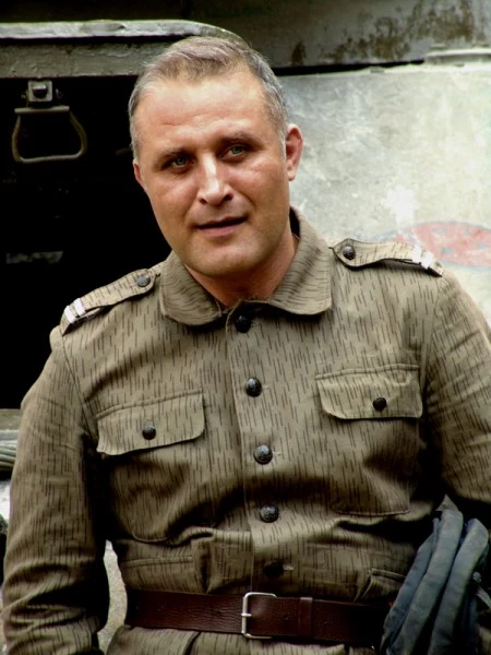 Przemysław Bluszcz (Romek)