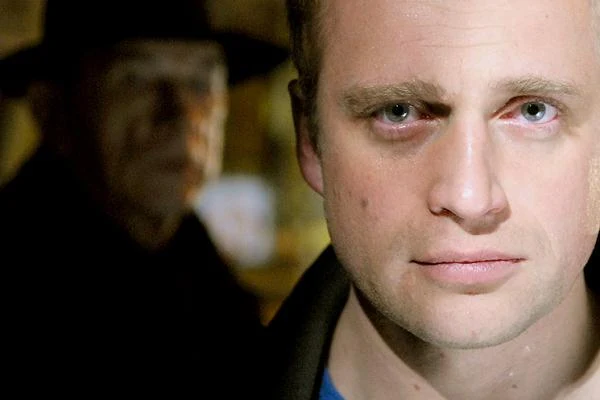 Kanwą serialu "Nazanaczony" (2009) są losy głównego bohatera Tadeusza Krala (Adamczyk), skromnego nauczyciela matematyki, który pewnego dnia spotyka postać tajemniczego nieznajomego.