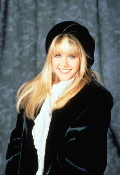 Urodziła się 26 września 1948 w Cambridge, w Anglii. Jej ojciec Brian Newton-John był oficerem MI6 i brał udział w pracach nad słynną Enigmą.