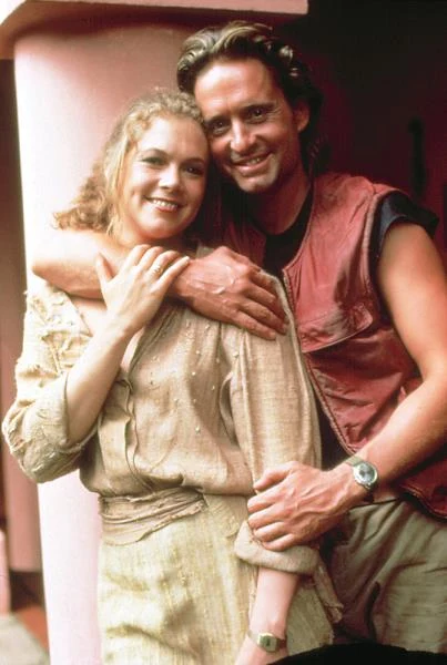 Kathleen Turner i Michael Douglas w filmie "Miłość, szmaragd i krokodyl" (1984)
