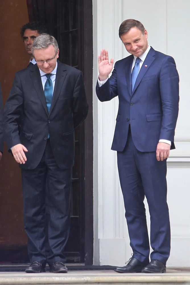 Prezydent elekt Andrzej Duda i poseł PiS Krzysztof Szczerski po spotkaniu w Pałacyku na Foksal w Warszawie z przebywającym z wizytą w Polsce wiceprezydentem i premierem Zjednoczonych Emiratów Arabskich, emirem Dubaju szejkiem Mohammedem bin Rashid Al-Maktoumem.