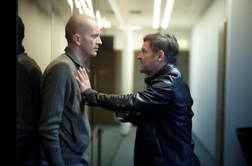 Tomasz Kot i Ireneusz Czop w scenie z filmu "Żyć nie umierać"