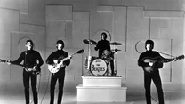 Zespół The Beatles na scenie w 1965 roku