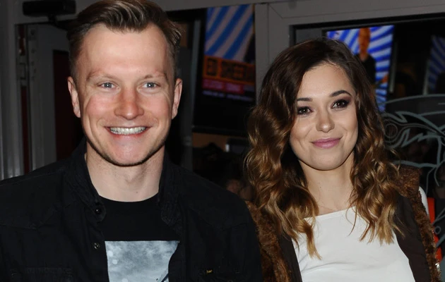 Kuba Wesołowski z żoną