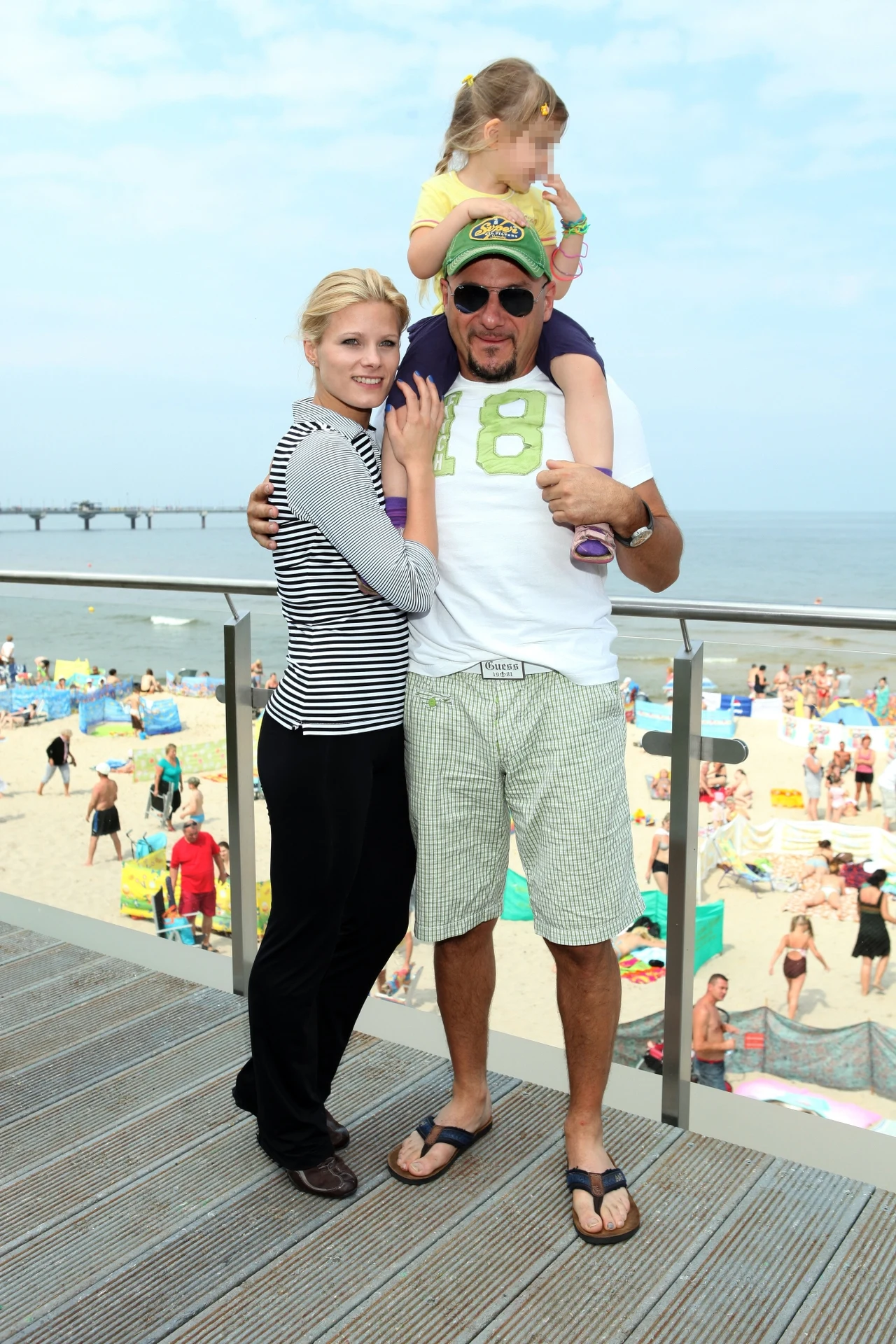 Anna Głogowska i Piotr Gąsowski z córką Julią, 2011 r.