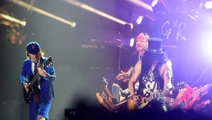 Angus Young (z lewej) gościnnie z Guns N'Roses (na zdjęciu także Axl Rose i Slash)