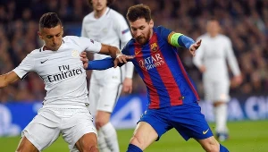 Obrońca PSG Marquinhos (z lewej) i Lionel Messi z Barcelony