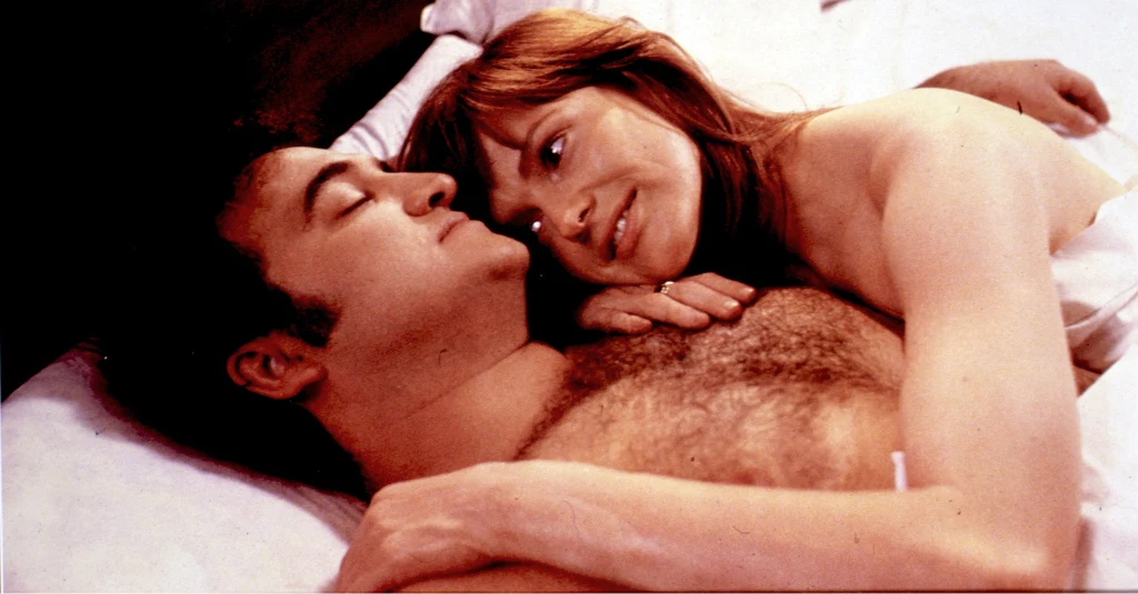 John Belushi i Blair Brown w filmie "Przez kontynent"