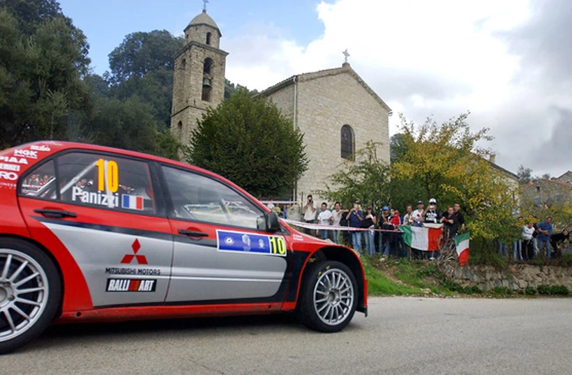 Panizzi  w  Mitsubishi Lancer WRC podczas Rajdu Korsyki w 2005 roku