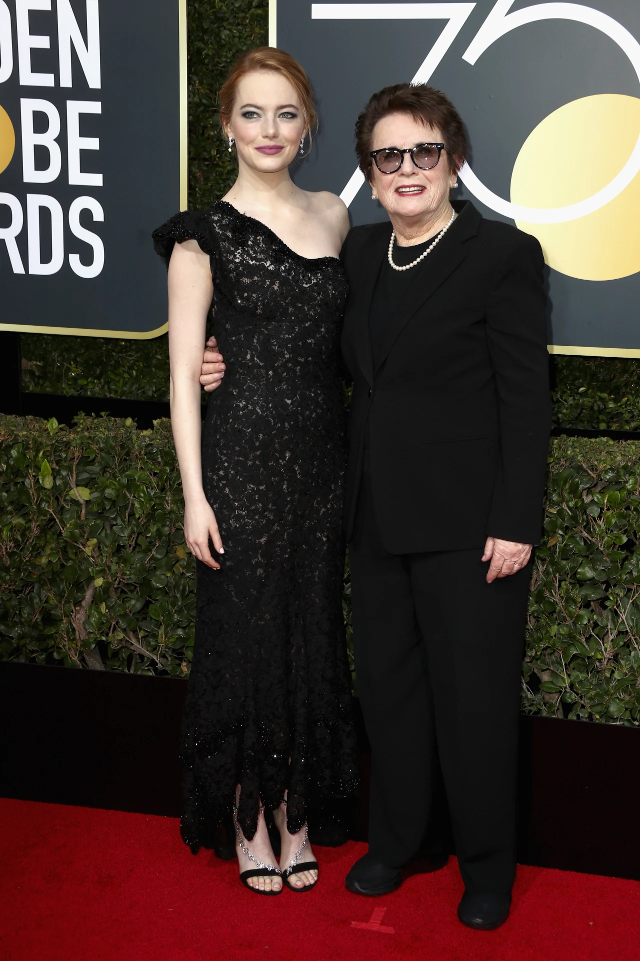 Emma Stone i Billie Jean King, w którą aktorka wcieliła się w "Wojnie płci"