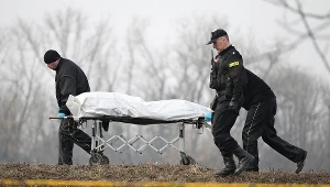 Wydobycie ciała z Wisły.