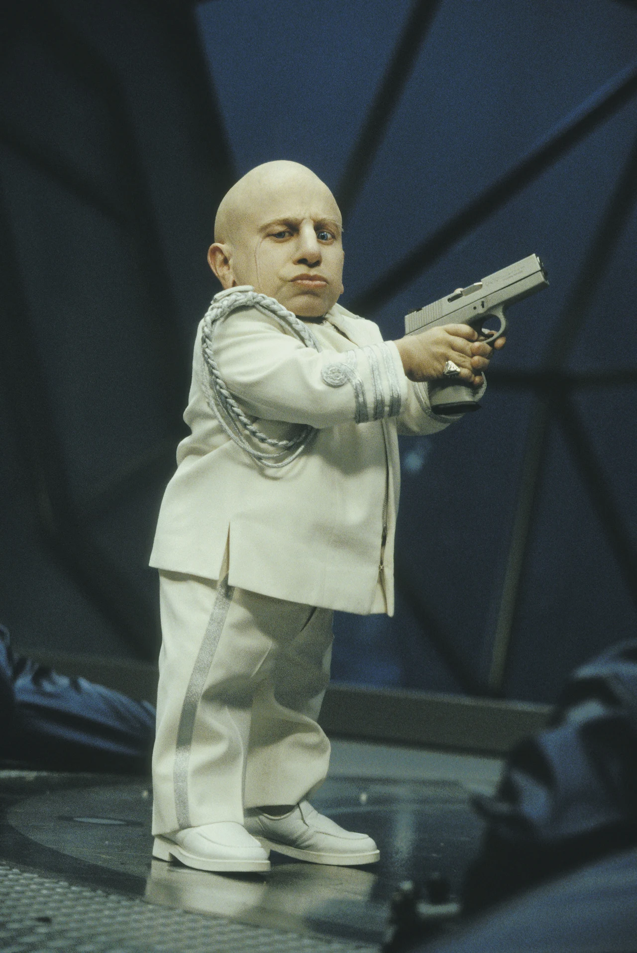 Troyer zadebiutował przed kamerą w 1996 roku w horrorze "Syndrom Pinocchia". Znany był jednak przede wszystkim z roli Mini-Me w serii komedii o Austinie Powersie - "Austin Powers 2 - Szpieg, który nie umiera nigdy" (1999) oraz "Austin Powers i Złoty Członek" (2002).