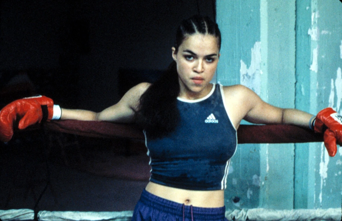 Debiutem aktorskim Michelle Rodriguez była rola Diany Guzman w filmie "Zbuntowana" (2000). Aby wystąpić w dramacie sportowym Karyn Kusamy 22-latka musiała pokonać 350 innych kandydatek. Młoda aktorka wcieliła się w agresywną nastolatkę, której grozi usunięcie ze szkoły z powodu nieustannych bójek. Dziewczyna postanawia więc swoją agresję wyładować na ringu. Kreacja pięściarki przyniosła debiutantce nagrody: Gotham oraz National Board of Review i pokazała, że drzemie w niej spory potencjał.