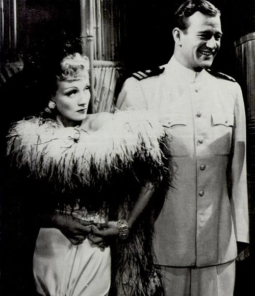 Marlene Dietrich i John Wayne na plakacie filmu "Siedmiu grzeszników" (Seven Sinners, 1940) Marlene Dietrich i John Wayne na plakacie filmu "Siedmiu grzeszników" (Seven Sinners, 1940)