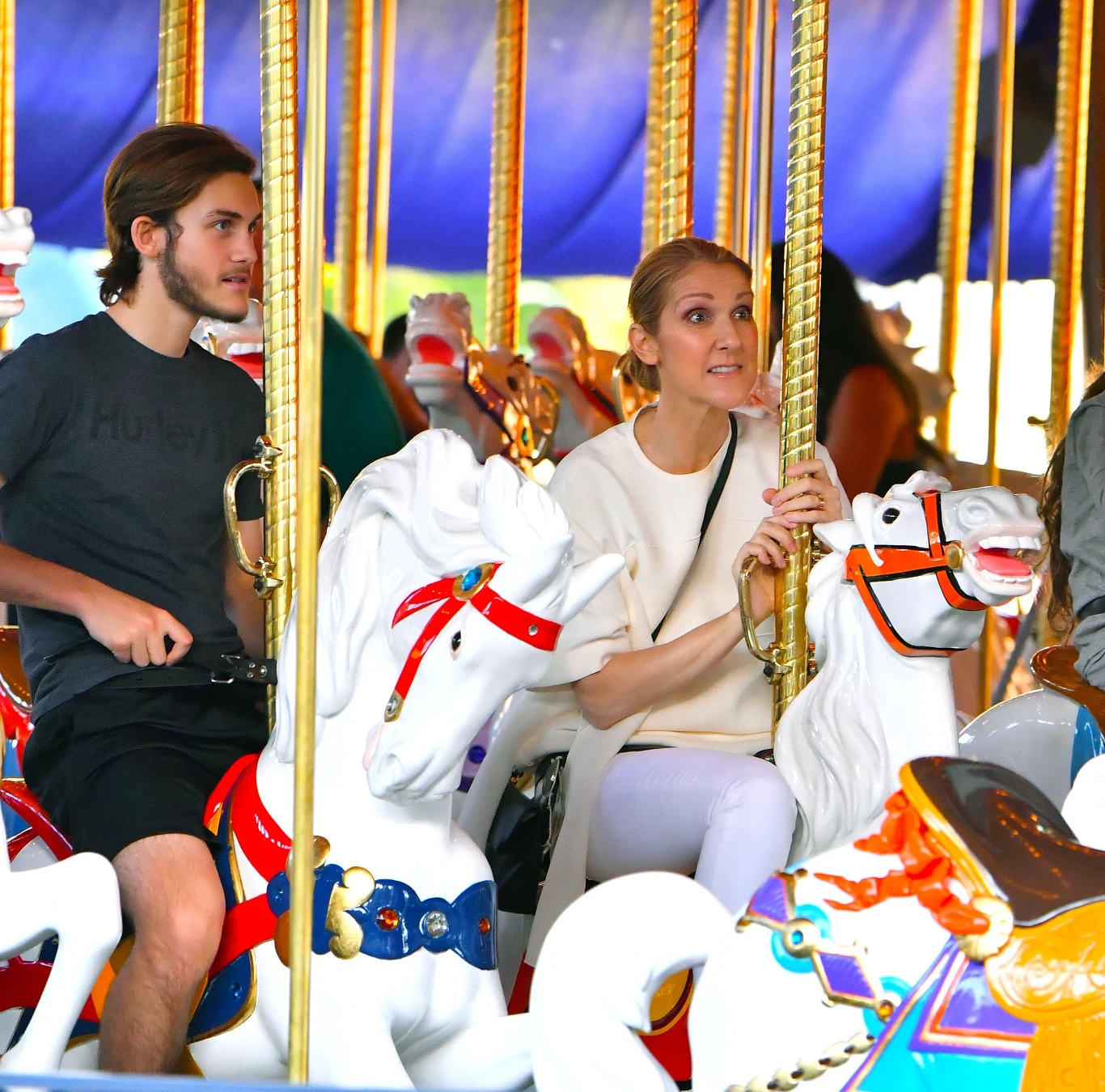 Rene-Charles Angelil z Celine Dion na karuzeli Rene-Charles Angelil z Celine Dion na karuzeli