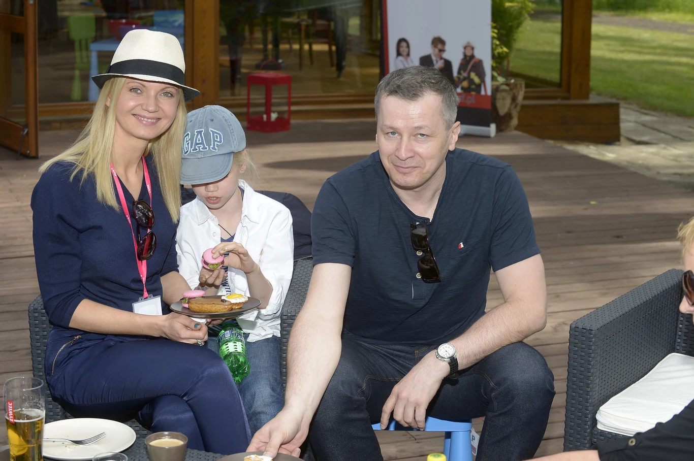 Olga Borys i Wojciech Majchrzak z córką Olga Borys i Wojciech Majchrzak z córką