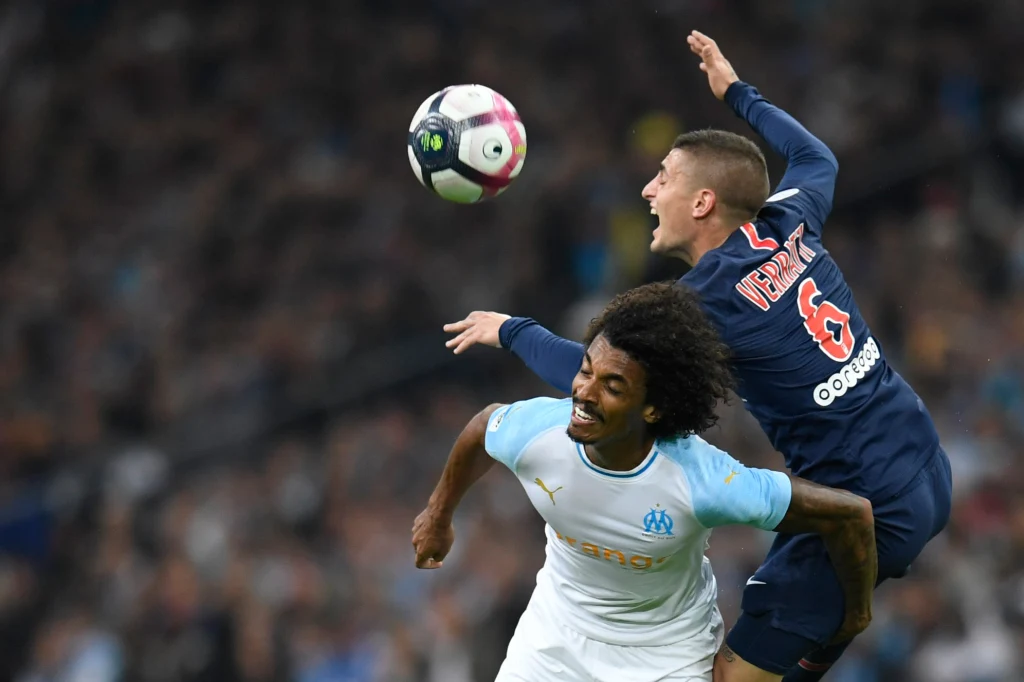 Marco Verratti w walce z Luizem Gustavo w Ligue 1 Marco Verratti w walce z Luizem Gustavo w Ligue 1