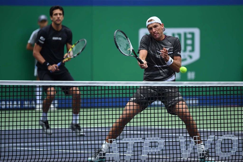 Łukasz Kubot (na pierwszym planie) i Marcelo Melo Łukasz Kubot (na pierwszym planie) i Marcelo Melo