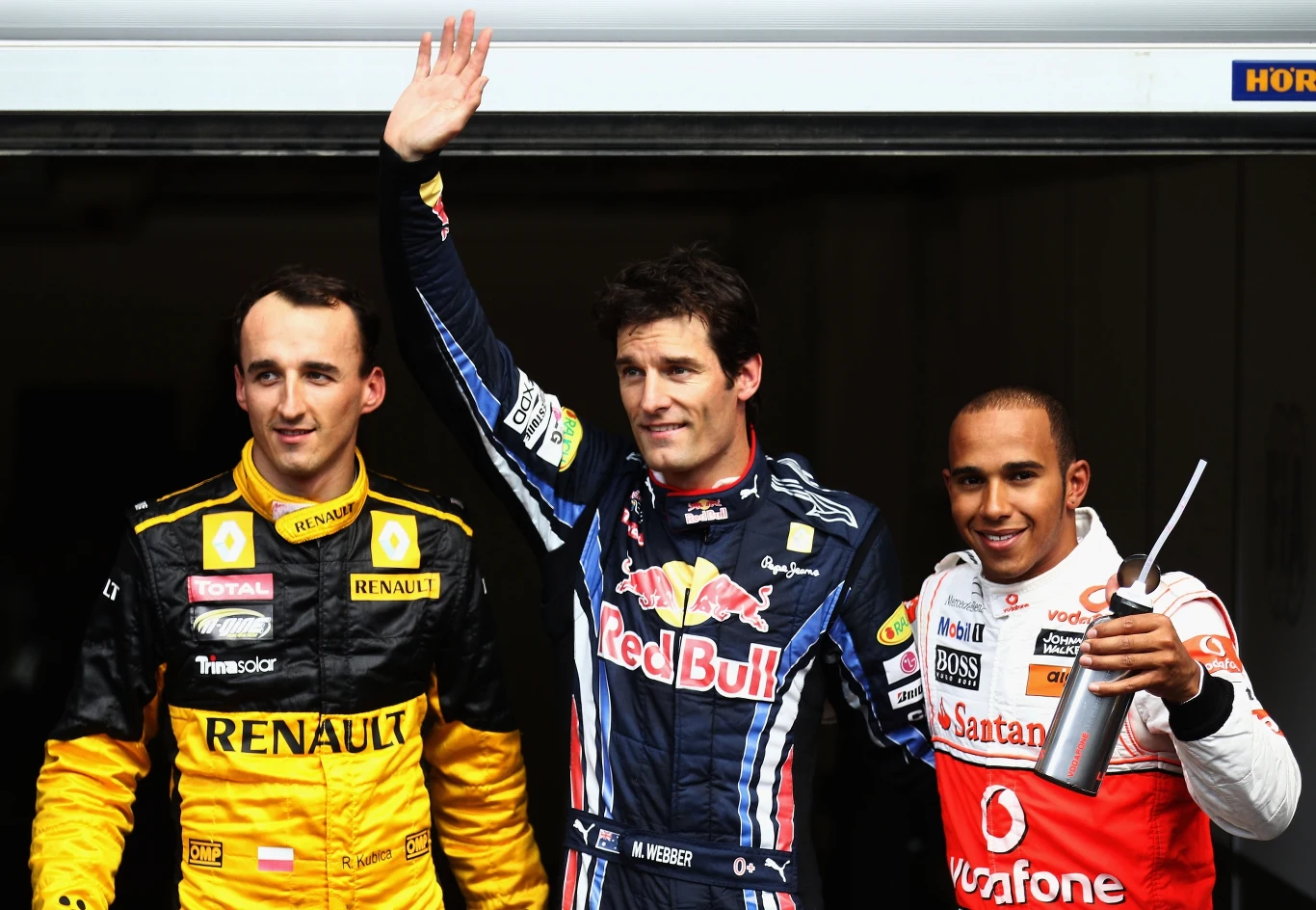 Najlepsza trójka w kwalifikacjach na torze Spa - Robert Kubica (3. miejsce), Mark Webber (1. miejsce) i Lewis Hamilton (2. miejsce). Sierpień 2010. Najlepsza trójka w kwalifikacjach na torze Spa - Robert Kubica (3. miejsce), Mark Webber (1. miejsce) i Lewis Hamilton (2. miejsce). Sierpień 2010.