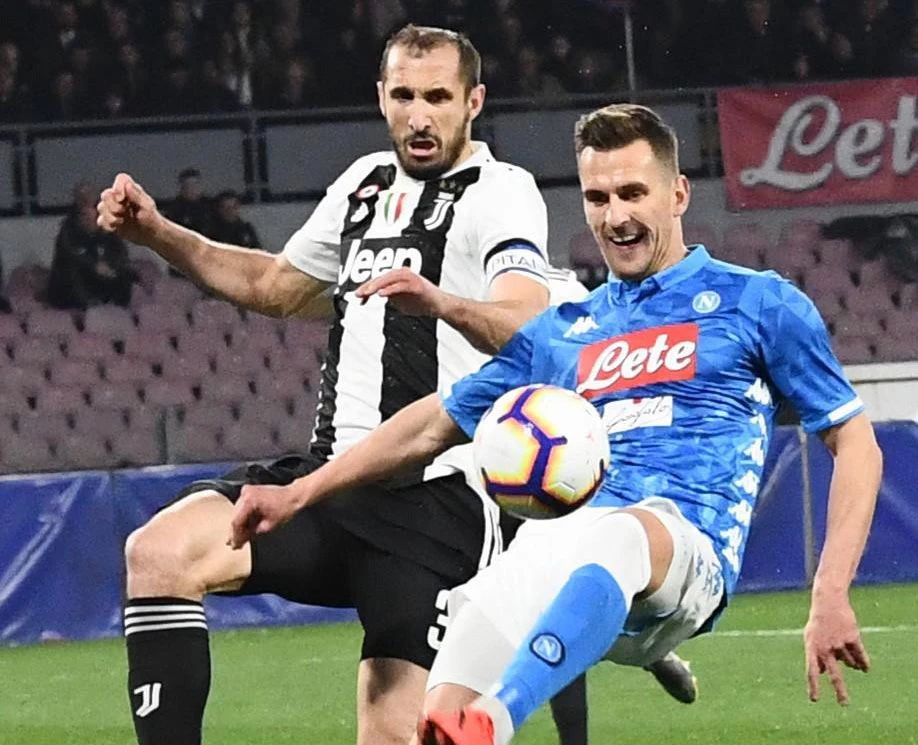 Arkadiusz Milik (z prawej) i Giorgio Chiellini