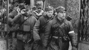 Kapitan Romuald Raj "Bury" na czele oddziału