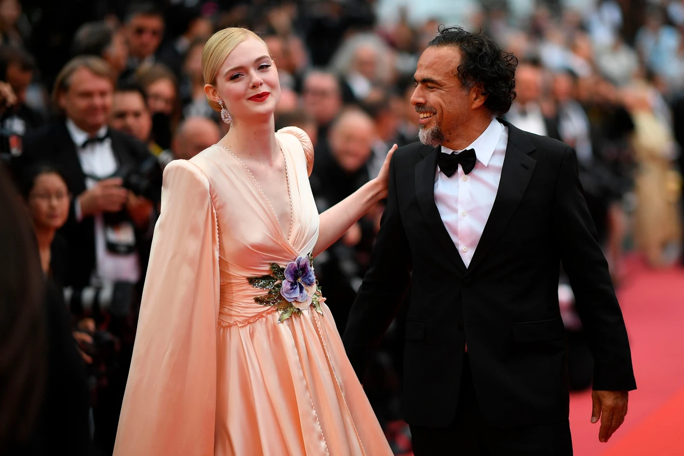 Elle Fanning i szef jury Alejandro Gonzalez Inarritu 