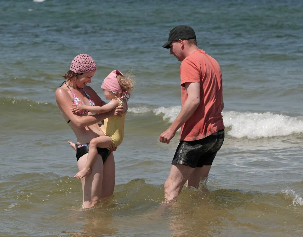 Aneta Todorczuk-Perchuć i Marcin Perchuć z dzieckiem, 2008 rok