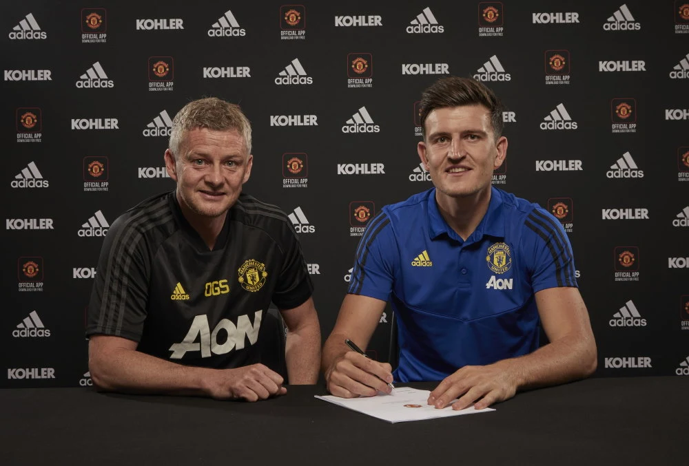 Menedżer Manchesteru United Ole Gunnar Solskjaer i Harry Maguire