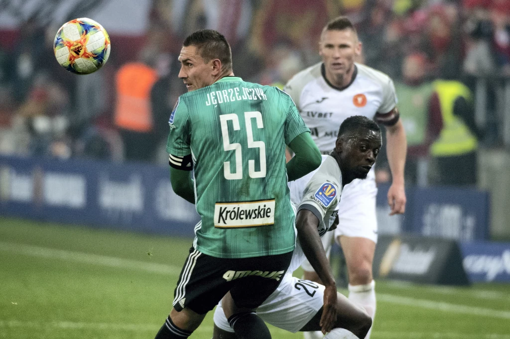 Christopher Mandiangu, Marcin Robak i Artur Jędrzejczyk w meczu Widzew - Legia Christopher Mandiangu, Marcin Robak i Artur Jędrzejczyk w meczu Widzew - Legia