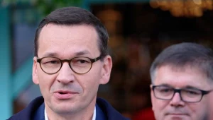 Mateusz Morawiecki (L)