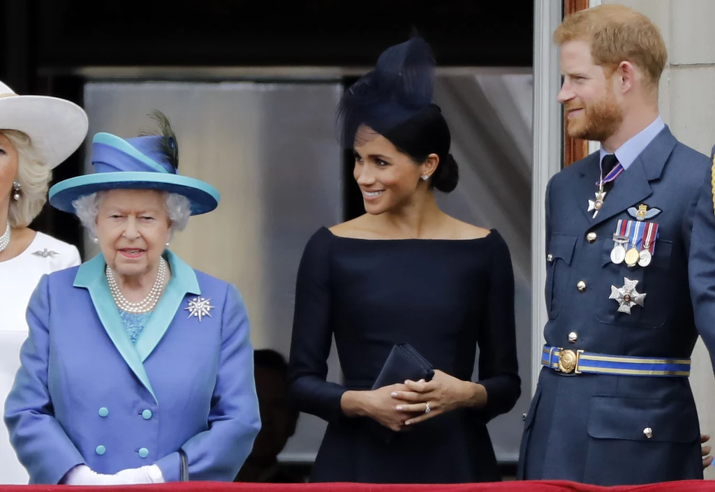 Królowa Elżbieta II, księżna Meghan i książę Harry