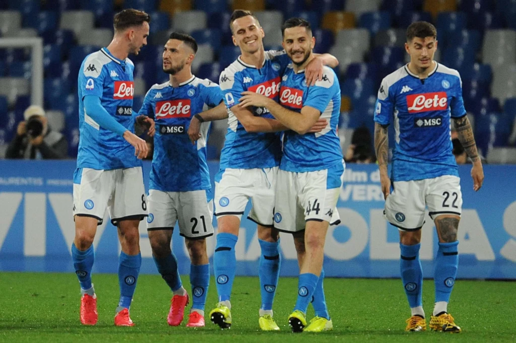 Arkadiusz Milik i strzelec bramki Kostas Manolas Arkadiusz Milik i strzelec bramki Kostas Manolas
