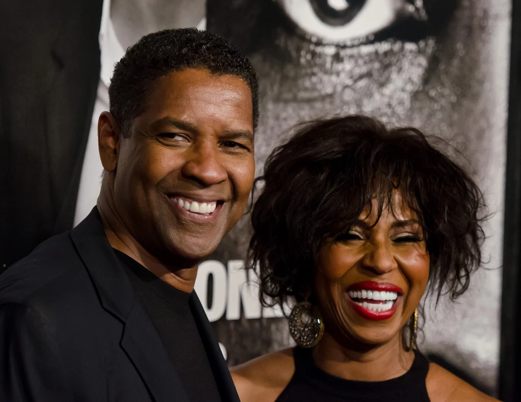 Amerykański aktor Denzel Washington i jego żona Pauletta są małżeństwem od 37 lat. Aktorka w 1970 roku została drugą wicemiss Karoliny Północnej. Być może jej filmografia nie jest tak imponująca, jak u małżonka, ale Pauletta Washington również ma koncie role w kilku ciekawych produkcjach. To właśnie na planie jednej z nich poznała Denzela. Para poznała się przy okazji kręcenia filmu "Wilma", a owocem ich miłości jest czworo dorosłych już dzieci. Część z nich podobnie, jak rodzice, związana jest z aktorstwem. Amerykański aktor Denzel Washington i jego żona Pauletta są małżeństwem od 37 lat. Aktorka w 1970 roku została drugą wicemiss Karoliny Północnej. Być może jej filmografia nie jest tak imponująca, jak u małżonka, ale Pauletta Washington również ma koncie role w kilku ciekawych produkcjach. To właśnie na planie jednej z nich poznała Denzela. Para poznała się przy okazji kręcenia filmu "Wilma", a owocem ich miłości jest czworo dorosłych już dzieci. Część z nich podobnie, jak rodzice, związana jest z aktorstwem.