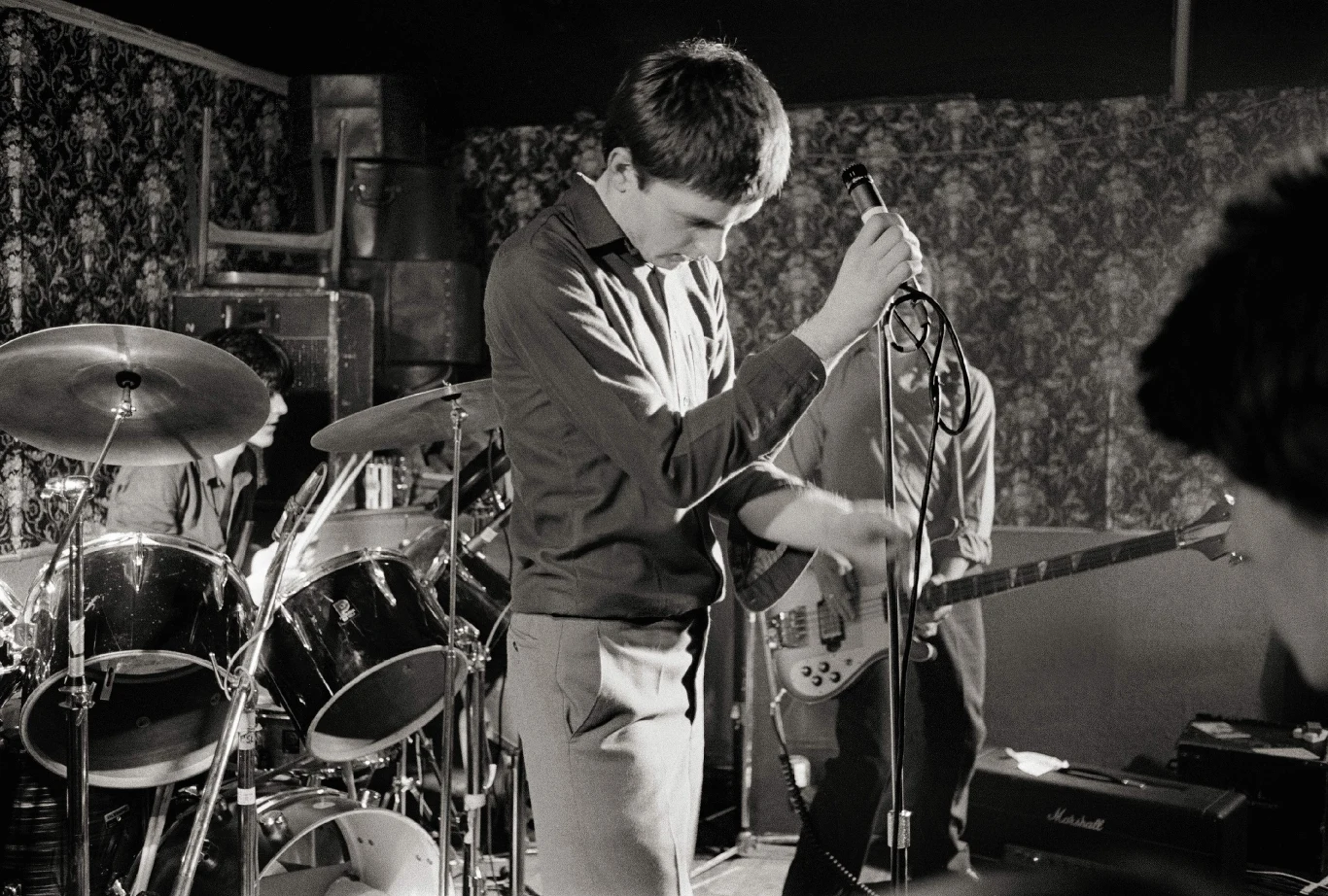 Latem 1976 na koncercie Sex Pistols spotkał gitarzystę Bernarda Sumnera oraz basistę Petera Hooka, z którym powołał do życia zespół Warsaw - była to nazwa na cześć piosenki Davida Bowiego pt. "Warszawa". Pod koniec 1977 roku grupa przerodziła się w Joy Division tworzącą muzykę w stylu post punk. Oprócz wspomnianych Sumnera, Hooka i Curtisa jej skład uzupełnił perkusista Stephen Morris (początkowo, przez krótki czas, perkusistą zespołu był Steve Brotherdale).