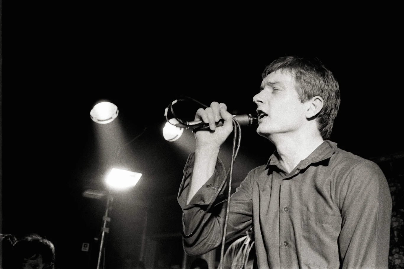 Do najbardziej znanych utworów Joy Division należą: "Love Will Tear Us Apart", "She's Lost Control", "Atmosphere", "Transmission" i "No Love Lost". Twórczość zespołu charakteryzują mroczny, depresyjny styl i podobne w nastroju teksty piosenek pisane przez Curtisa. Ian Curtis zmagał się epilepsją, a ataki choroby, które zdarzały się podczas koncertów, były wyjątkowo przykre. Ponadto muzyk cierpiał na depresję, która odbierała mu chęć do cieszenia się z życia osobistego i sukcesów, jakie odnosił wspólnie z Joy Division. Mimo że Curtis był uwielbiany przez fanów, odczuwał emocjonalne wyobcowanie z otoczenia i brak zrozumienia u innych.