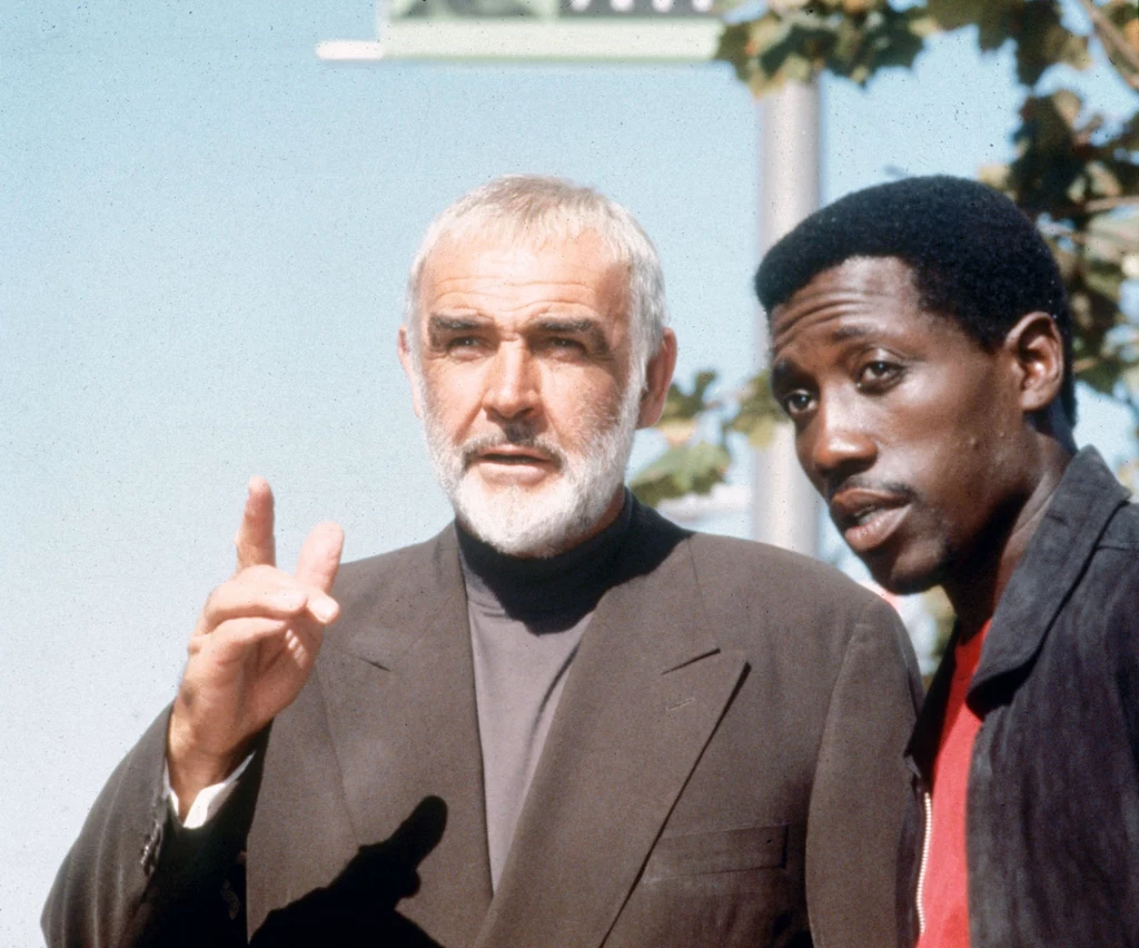 Wesley Snipes od wczesnych lat życia wiedział, że chce zostać aktorem. W szkole średniej i na studiach nabywał odpowiednich umiejętności, a później występował na scenach teatralnych. Grał między innymi na Broadwayu, gdzie wystąpił w "The Boys of Winter". Pierwszym filmem, w którym zagrał były "Dzikie koty". Na zdjęciu: Wesley Snipes i Sean Connery na planie filmu: "Rising Sun" Wesley Snipes od wczesnych lat życia wiedział, że chce zostać aktorem. W szkole średniej i na studiach nabywał odpowiednich umiejętności, a później występował na scenach teatralnych. Grał między innymi na Broadwayu, gdzie wystąpił w "The Boys of Winter". Pierwszym filmem, w którym zagrał były "Dzikie koty". Na zdjęciu: Wesley Snipes i Sean Connery na planie filmu: "Rising Sun"