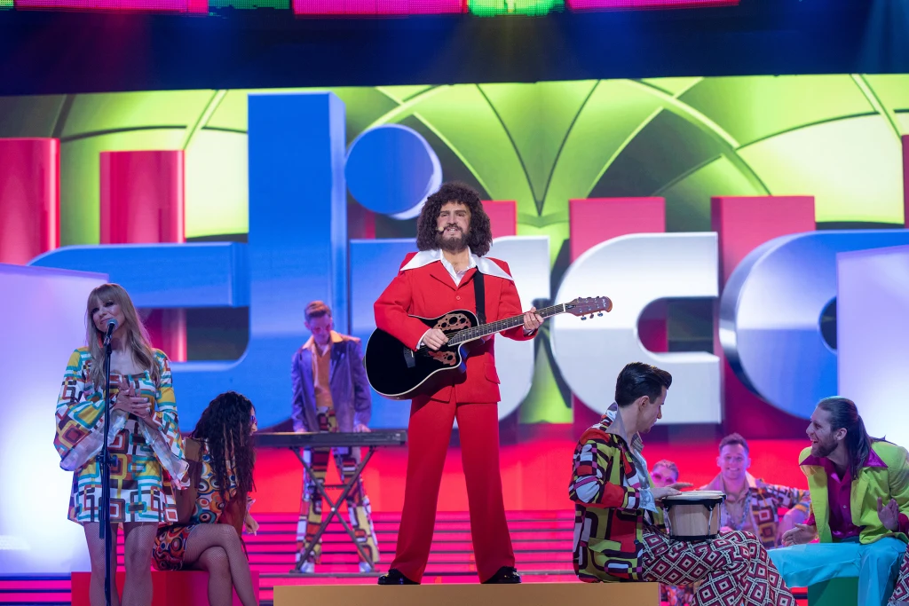 Natalia Avelon jako George Baker Natalia Avelon jako George Baker