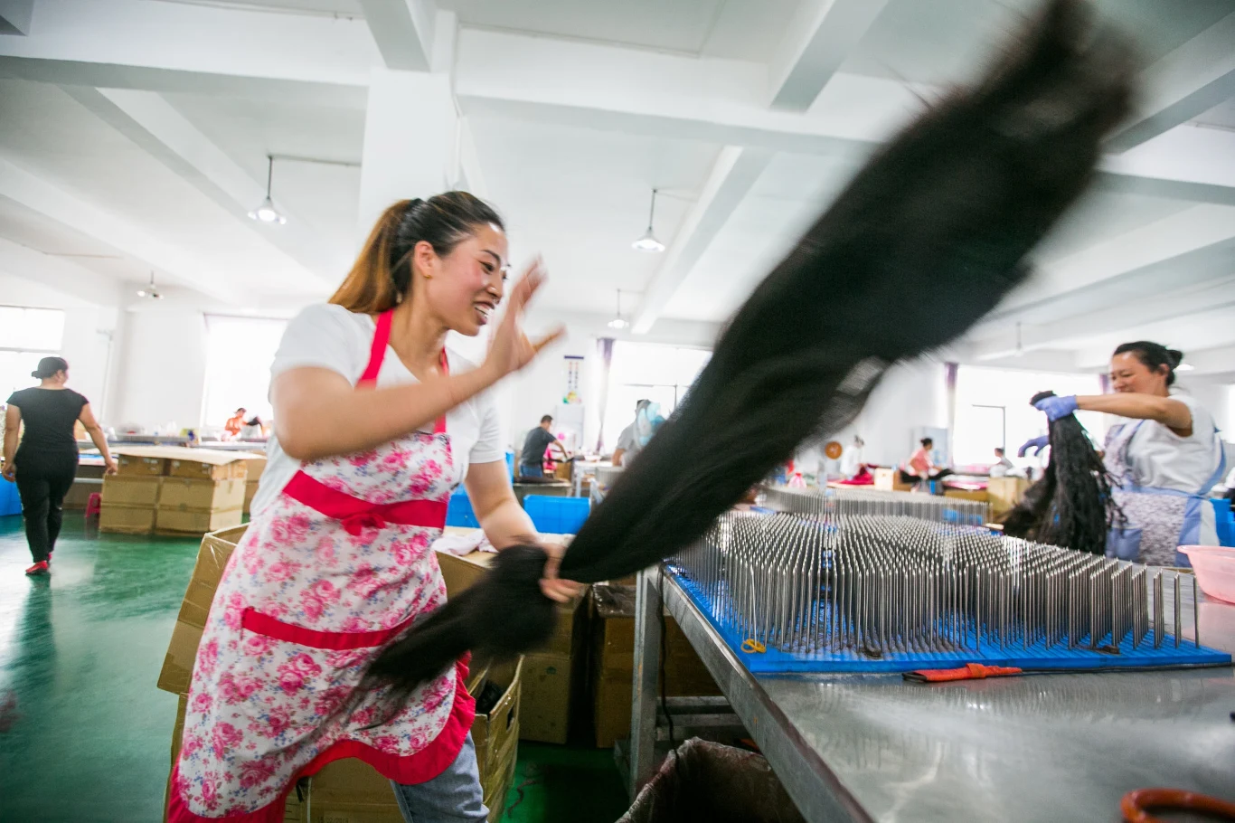 Chińska fabryka włosów w Bijie.
