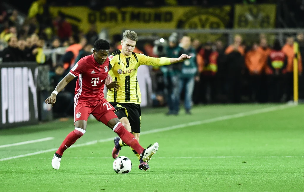 David Alaba (z lewej) w starciu z Łukaszem Piszczkiem David Alaba (z lewej) w starciu z Łukaszem Piszczkiem