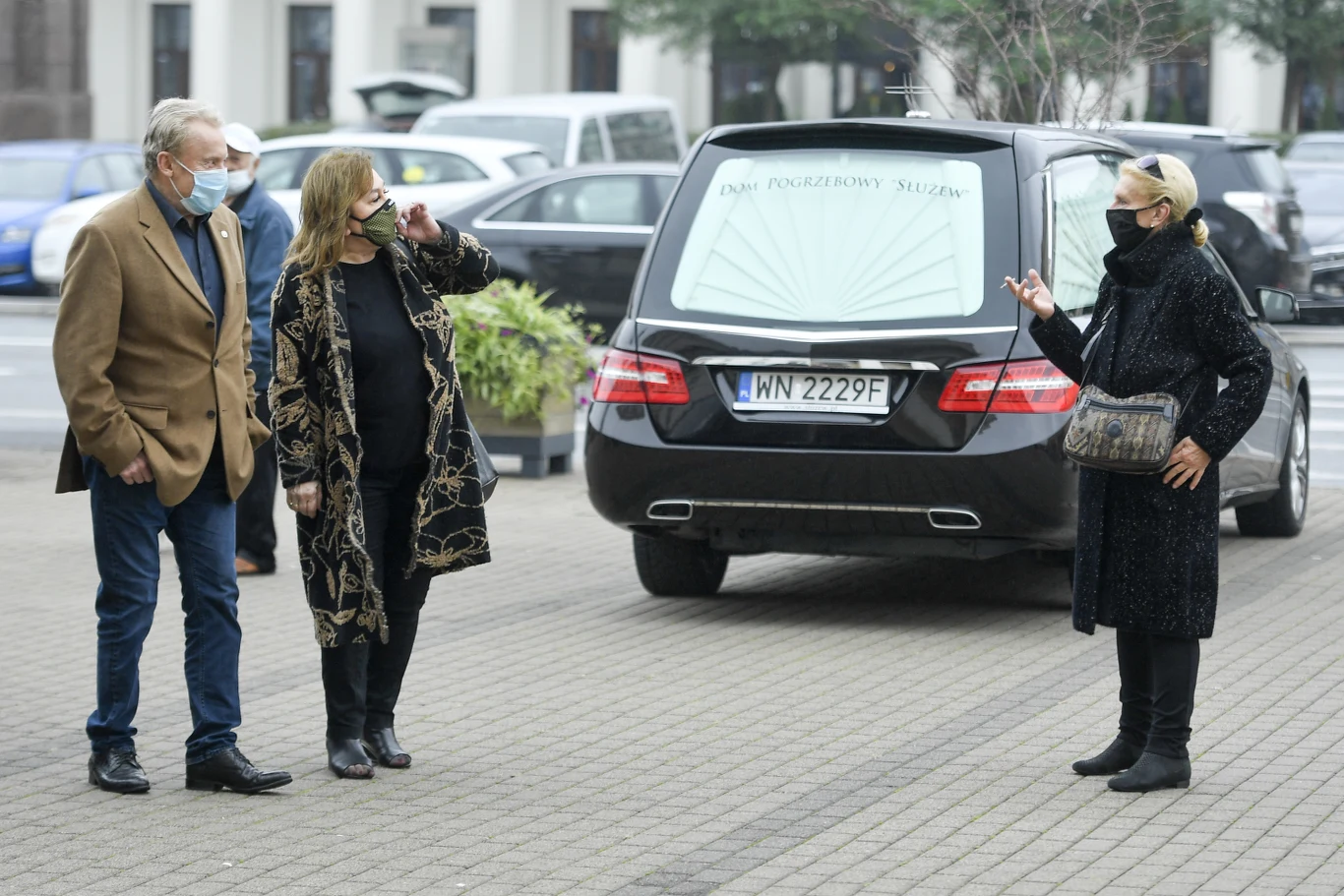 Daniel Olbrychski, Krystyna Demska-Olbrychska i Ewa Wiśniewska na pogrzebie Wojciecha Pszoniaka.